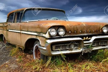 14432815-Picturesque-rural-landscape-with-old-fashioned-car--Stock-Photo